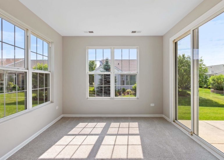 Virtual staging services for real estate photography - empty sunroom before digital staging